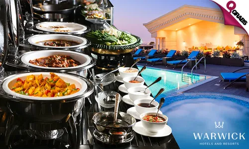 Lunch OR Dinner Buffet with Pool Access at Warwick Doha Hotel!